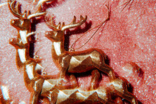 Kaleidoscopic Image Of A Reindeer-shaped Ornament