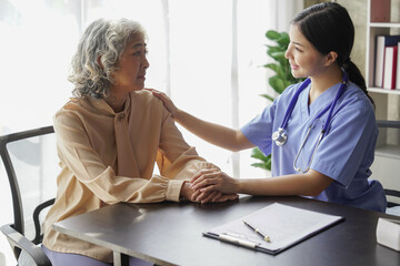 Wall Mural -  consulting female patient about pills and discussing health treatment sitting in the office at the desk. Medicine and health care concept. Doctor prescribing medicine to patient in the office.