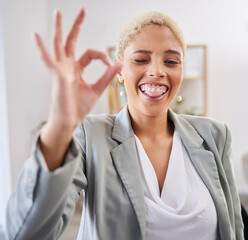 Sticker - Portrait, tongue and emoji with a business black woman winking in her office at work to gesture a perfect hand sign. Face, motivation and succes with a female employee feeling happy or proud