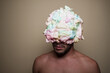 © Ibai Acevedo/Stocksy - Man with head full of ice cream