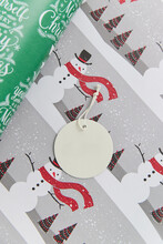 Round Blank Label On Christmas Paper