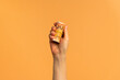 © Pixel Stories/Stocksy - Hand holding euro money