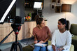 © gpointstudio - Two female vloggers making plan and discussing before recording