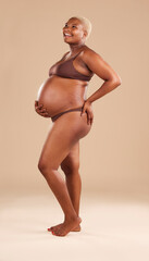 Wall Mural - Black woman, laughing or holding pregnant stomach on studio background in body empowerment, love or baby support. Smile, happy and pregnancy model in body underwear or ready for motherhood on mock up