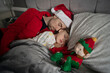 © Vradiy Art/Stocksy - Father and son are sleeping at Christmas eve