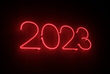 Red Neon Led Sign On Wall , 2023 New Year Concept.