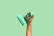 © Pixel Stories/Stocksy - Hands holding gaming joystick controller