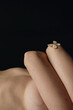 © Anastasia Mihaylova (Shpara)/Stocksy - Close up photo of the woman's skin texture of elbows and butterfly