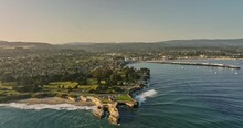 Santa Cruz California Aerial V3 Cinematic Drone Fly Around Lighthouse Point Capturing State Beach, Neighborhood Town And Municipal Wharf At Sunset Golden Hour - Shot With Mavic 3 Cine - May 2022