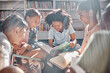 © Lumeez/peopleimages.com - Education, books or students reading in a library for group learning development or growth. Storytelling, kids or happy children talking together for knowledge on funny fantasy stories at school