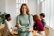 © Nuria Seguí/Stocksy - Senior Businesswoman Portrait In Office