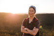 © Rob and Julia Campbell/Stocksy - Portrait of healthy hiker woman on top of mountain.