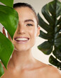 © Wesley JvR/peopleimages.com - Beauty, skincare and woman portrait with green plant for natural skin dermatology cosmetic product. Happy face of aesthetic model in studio for sustainable glow or makeup for health and wellness