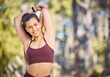 © Jordan C/peopleimages.com - Fitness, stretching arms and portrait of woman in nature with smile for running, marathon training and workout. Sports mockup, healthy body and girl in forest park for wellness, cardio and active