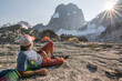 © Cavan Images - Resting mountain climber in Bugaboo Mountains, British Columbia, Canada