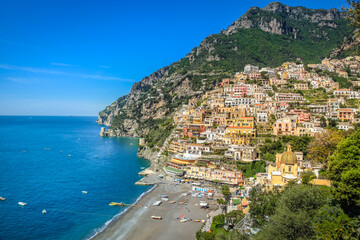 Wall Mural - Above Positano city cliffs and marina with boats and yacht, amalfi coast, Italy