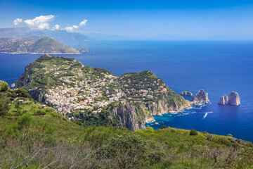 Wall Mural - Above Capri city cliffs and Faraglioni with boats and yacht, amalfi coast, Italy