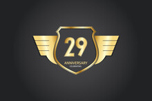 29 Years Anniversary Logotype 3D Golden Stylized Modern Shape Winged Shield On Black Background