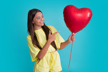 Canvas Print - Lovely little teen girl playing with red heart shaped balloon. Happy girl face, positive and smiling emotions.