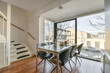 © ADDICTIVE STOCK - Modern Home With table and chairs next to a window