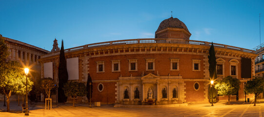 Wall Mural - Valencia - The panorama of historic University builiding with the square at dusk.