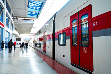 Double-decker high-speed passenger train at the station