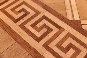 Wall Mural - Greek Key or Meander, vintage parquet. Background photo texture