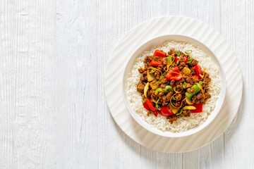 Wall Mural - crispy ground beef with stir-fried veggies in bowl