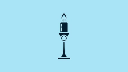 Canvas Print - Blue Burning candle in candlestick icon isolated on blue background. Old fashioned lit candle. Cylindrical candle stick with burning flame. 4K Video motion graphic animation