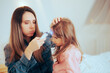 © nicoletaionescu - Worried Mom Using a Digital Thermometer to Check for Fever. Concerned mother measuring the forehead temperature of her little daughter