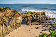 Natural Arch In The Rock On The Beach Santa Cruz, California.
