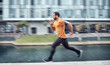 © D Lahoud/peopleimages.com - Blurred, fitness and man running as exercise in the city training, workout and workout outdoors in a town. Athlete, runner and fit male sprint fast for wellness, cardio and health lifestyle