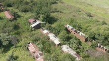 Drone Aerial Footage Of An Abandoned Farm Outbuildings In Decay Foulage Growth