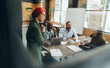 © Jacob Lund - Multicultural businesspeople having a meeting in a boardroom