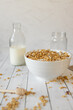 Close up granola milk and bowl with honey