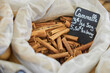 Cinnamon sticks. Price sign in French. Cinnamon promotes appetite and stimulates intestinal activity.