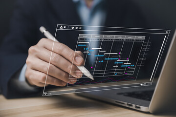 Fototapete - Male manager managing business planning project schedule in the office. Gantt chart showing on virtual screen.	
