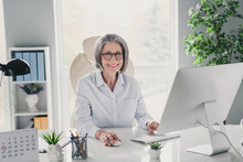 Photo Portrait Of Mature Grandma Marketer Ceo Start Up Manager Sitting Boss Chair Wear Specs Modern Interior Office