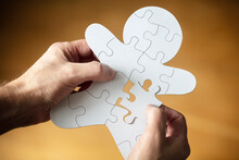 Businessman Assembling Missing Jigsaw Puzzle Piece Human Team Employee