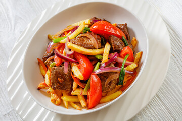 Canvas Print - Lomo saltado, fried beef, french fries, veggies