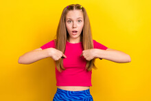 Photo Of Young Funny Excited Stressed Teenager Girl Wear Pink T-shirt Pointing Fingers Confused Herself Blaming Isolated On Yellow Color Background