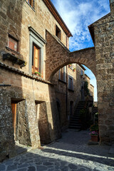 Wall Mural - Cobbled street with stone buildings in Bagnoregio