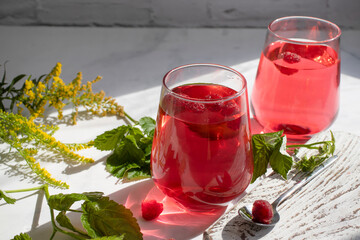 Canvas Print - Drink with raspberries on a light background
