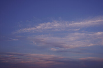 Wall Mural - orange pink purple sunset. delicate shades. beautiful evening sky with clouds. elegant background fo