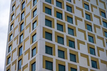 Wall Mural - Office high rise with white and green exterior.