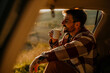 © La Famiglia - Cheerful man on a road trip, spending quality time in sunny nature.