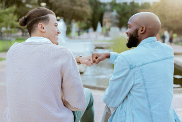 Poster - Friends, students and men fist bump together on campus with smile, diversity and hope for future. Friendship, university and happy college people sitting outside, gen z man and friend with handshake.