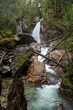 mystical waterfall called Sutherland Falls in Revelstoke in canada
