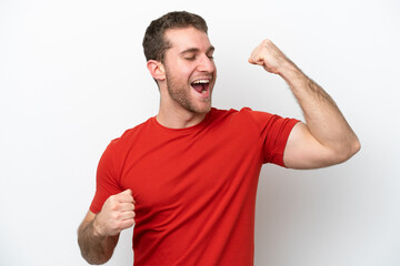 Wall Mural - Young caucasian man isolated on white background celebrating a victory