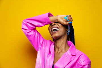 Beautiful african american woman with afro pigtails hairstyle and stylish clothes - Portrait of young black girl in studio, creative portrait with fashionable style in studio